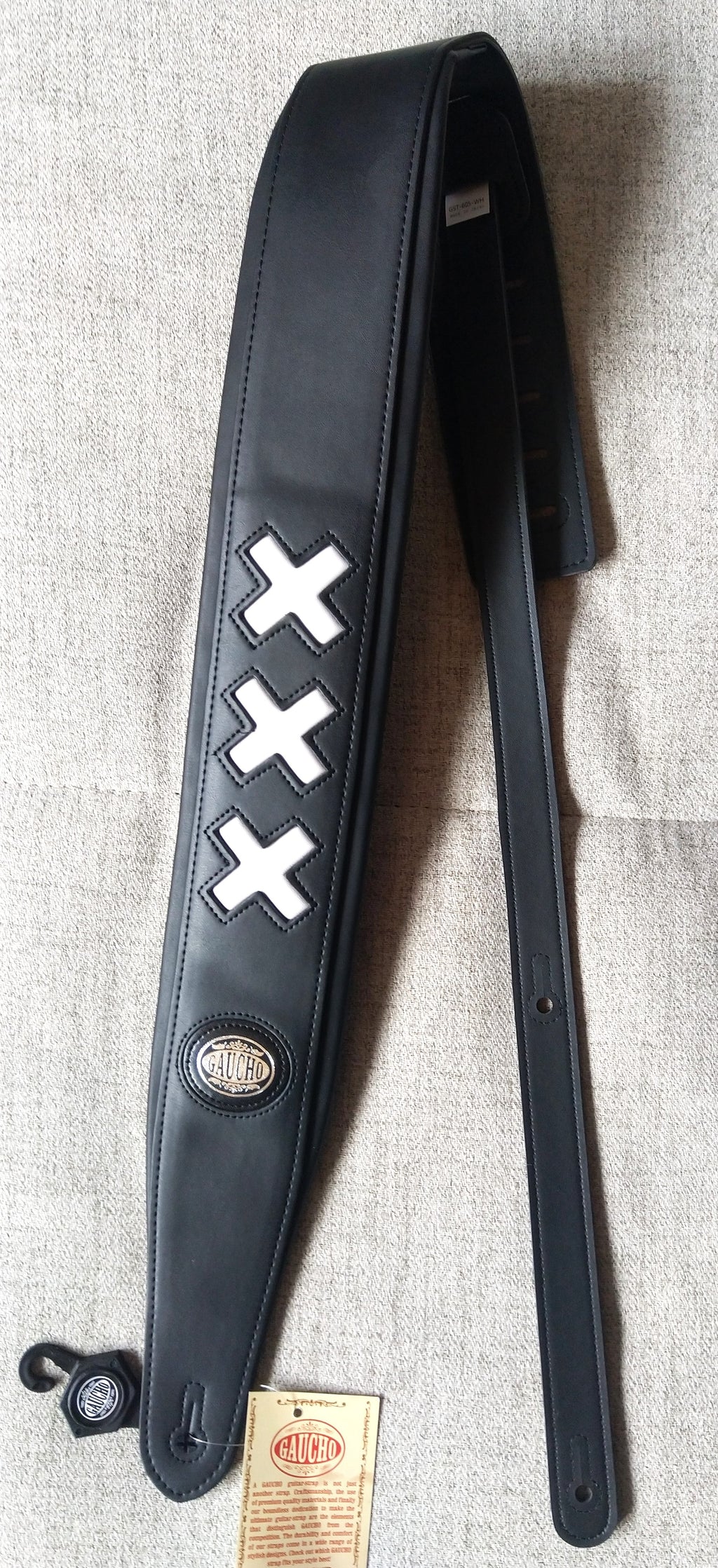 Gitarrengurt Gaucho Padded Deluxe Series guitar strap schwarz mit weißen Kreuzen